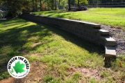Retaining-wall-curved-side-Between-the-Edges-landscaping-EvansGA