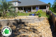 Retaining-wall-river-rocks-Between-the-Edges-landscaping-AugustaGA