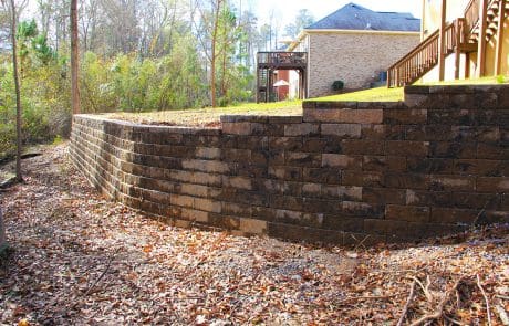 Backyard retaining wall installation in Martinez, GA