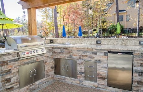 Outdoor kitchen design and installation in Aiken, SC - a project by Between The Edges