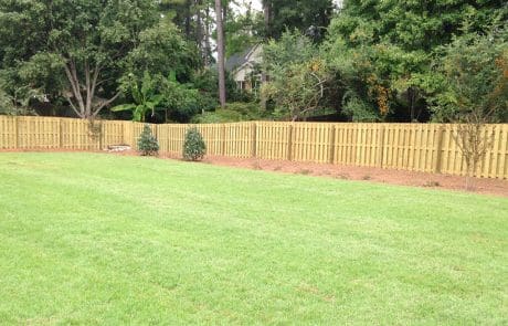 Sodding and wood fence installation in Harlem, GA - Between The Edges